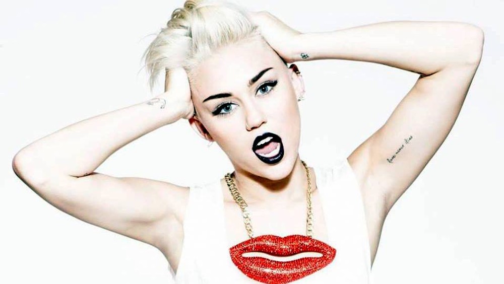 Miley Cyrus s pusou