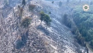 Národný park České Švajčiarsko horí už piaty deň. Na pomoc priletí ďalšia slovenská posádka