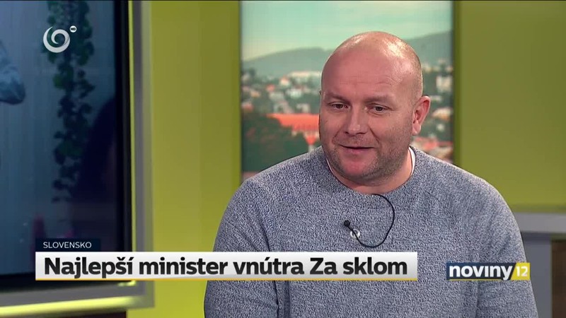 Za sklom - Minister vnútra