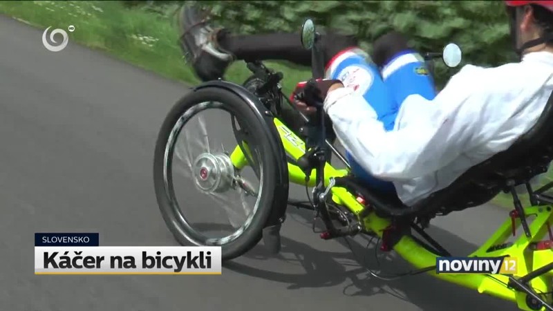 Káčer na bicykli