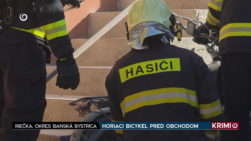 HORIACI BICYKEL PRED OBCHODOM