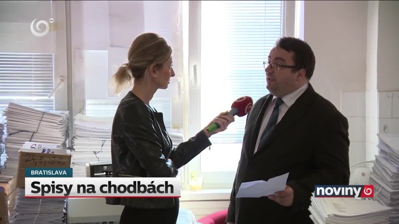 Spisy na chodbách