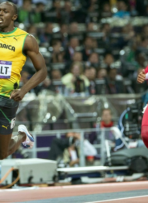 Usain Bolt radostný zdvihnutý prst