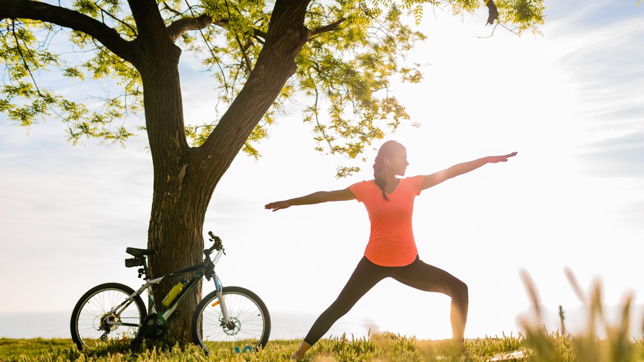 slim-beautiful-woman-silhouette-doing-sports-morning-park-doing-yoga