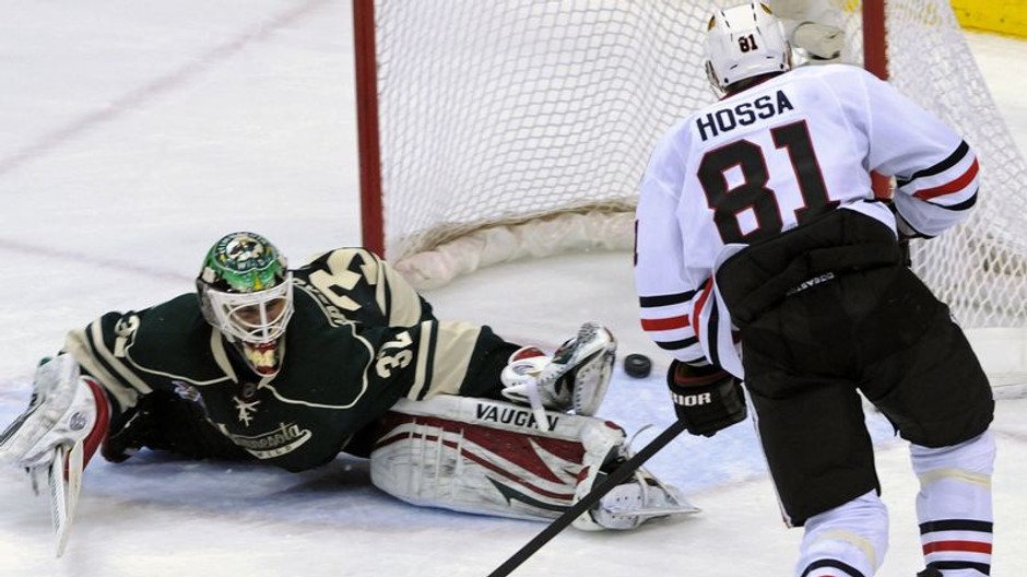 Hossa v zápase proti Minnesote