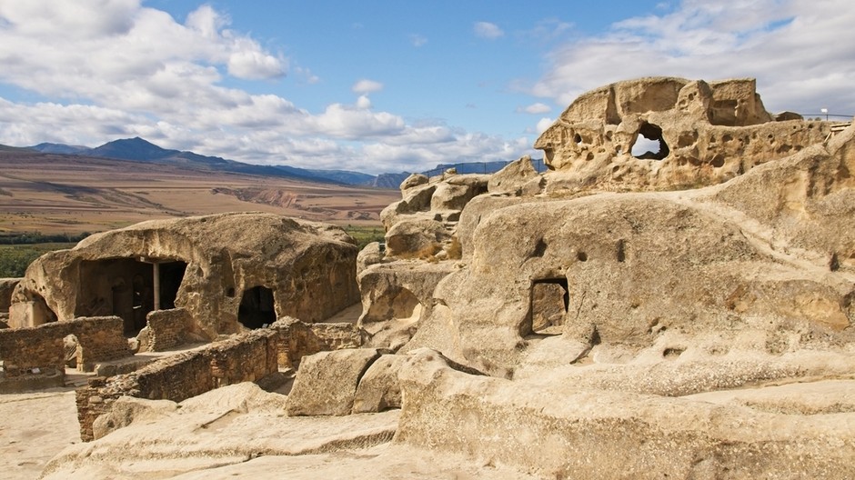 low-angle-shot-ancient-rock-hewn-town-uplistsikhe-georgia