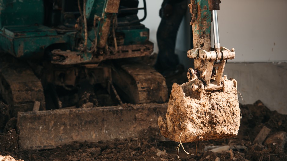 close-up-worker-backhoe-working-construction-site