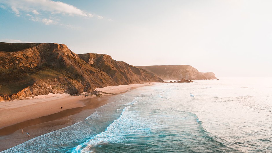 breathtaking-view-of-the-ocean-and-the-rocky-cliffs-under-the-beautiful-bright-sky